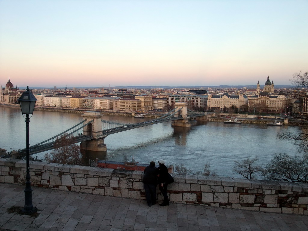 The Hungarian Parliament Building, the Széchenyi Chain Bridge over the Danube river, the Gresham Palace and Saint Stephen`s Basilica, viewed from the front of Buda Castle