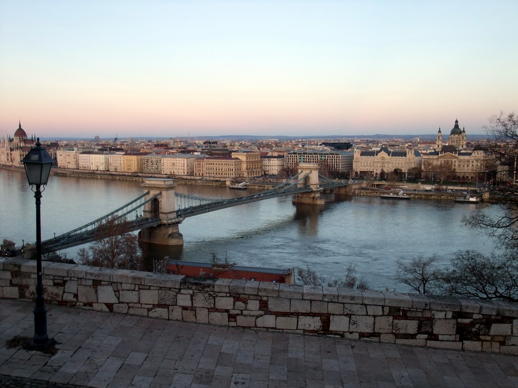 The Hungarian Parliament Building, the Széchenyi Chain Bridge over the Danube river, the Gresham Palace and Saint Stephen`s Basilica, viewed from the front of Buda Castle