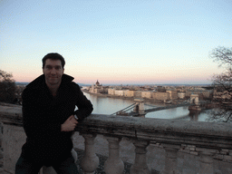 Tim with the Hungarian Parliament Building and the Széchenyi Chain Bridge over the Danube river, viewed from the front of Buda Castle