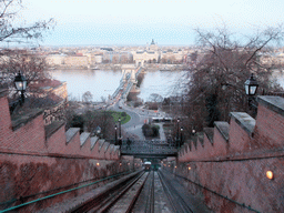 The Budapest Castle Hill Funicular with a view on the Széchenyi Chain Bridge over the Danube river, the Gresham Palace and Saint Stephen`s Basilica