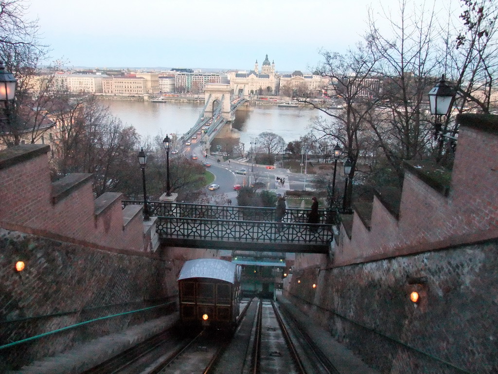 The Budapest Castle Hill Funicular with a view on the Széchenyi Chain Bridge over the Danube river, the Gresham Palace and Saint Stephen`s Basilica