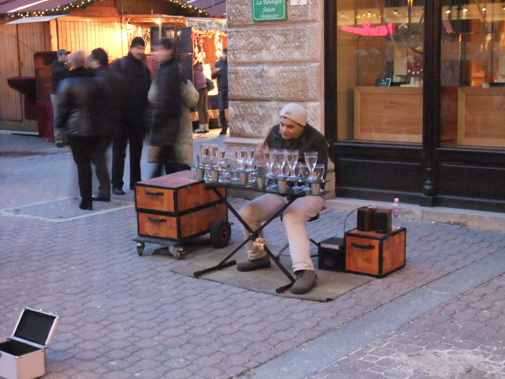 Glass musician in Vaci Utca street