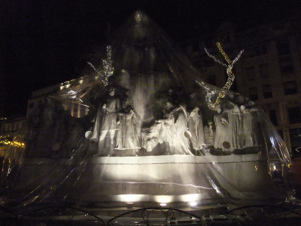 Statue of Mihály Vörösmarty at Vörösmarty Tér square, by night