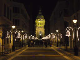 Zrinyi Utca street and Saint Stephen`s Basilica, by night