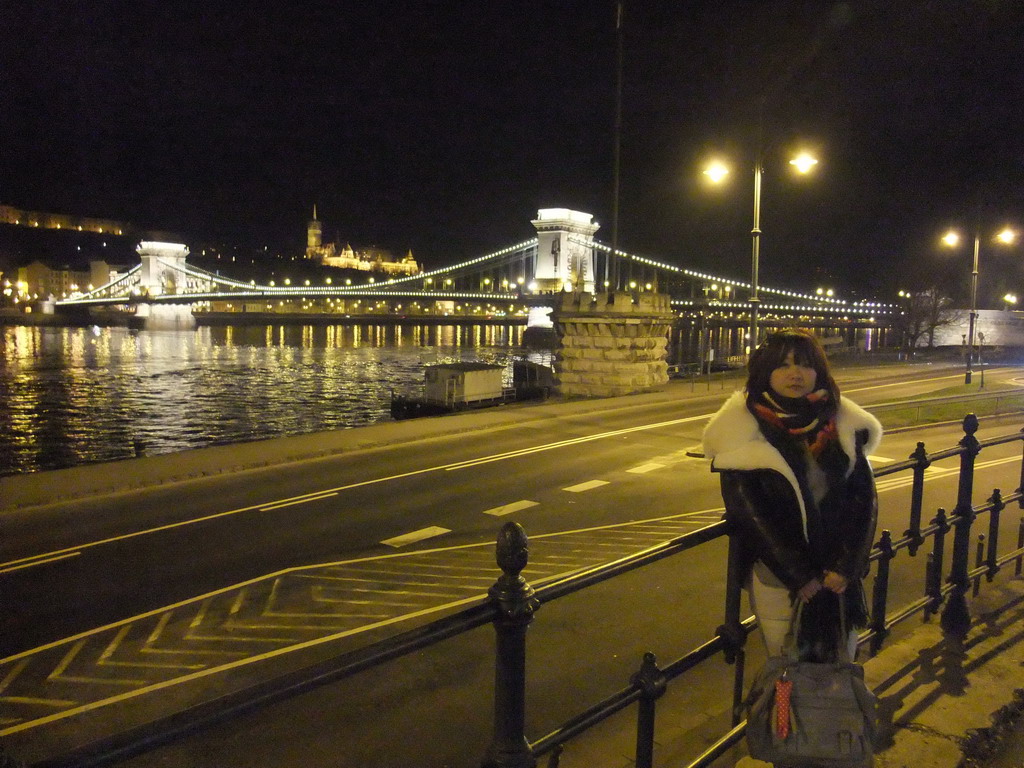 Miaomiao at the Széchenyi Chain Bridge over the Danube river and the Matthias Church, by night