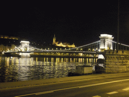 The Széchenyi Chain Bridge over the Danube river, the Matthias Church and the Fisherman`s Bastion, by night