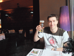 Tim with beer in our lunch restaurant `Cyrano`