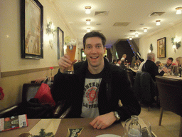 Tim with beer in our dinner restaurant in Vaci Utca street