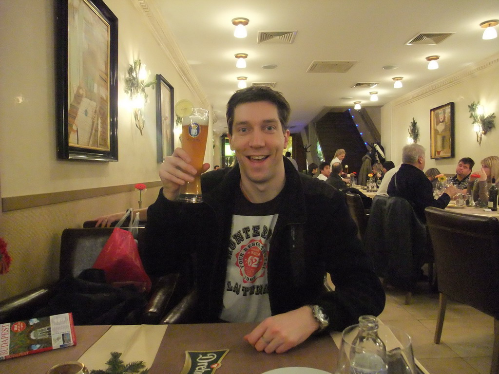 Tim with beer in our dinner restaurant in Vaci Utca street