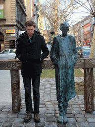 Tim with a statue of Miklós Radnóti
