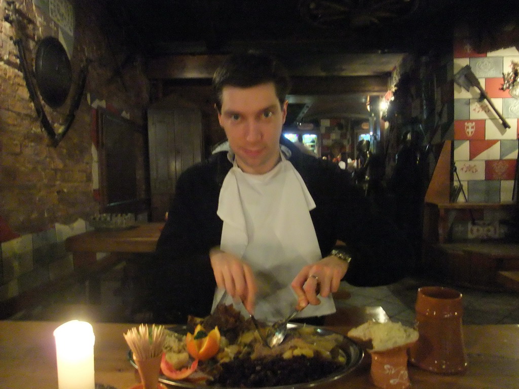 Tim having dinner in the restaurant `Sir Lancelot`