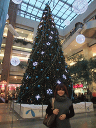 Miaomiao with a christmas tree in the WestEnd City Center shopping mall