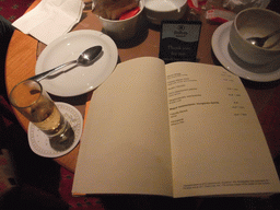 Glass of Palinka, coffee and menu card in the lobby of the Hilton Budapest Hotel