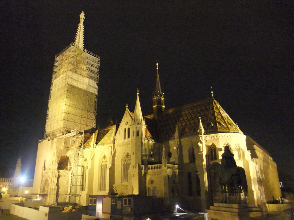 The Matthias Church, the Plague Monument and a bronze statue of Stephen I of Hungary, by night