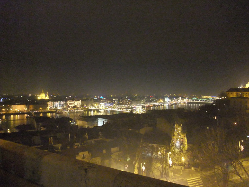 The Széchenyi Chain Bridge and the Elisabeth Bridge over the Danube river, the Gresham Palace and Saint Stephen`s Basilica, viewed from the Fisherman`s Bastion, by night