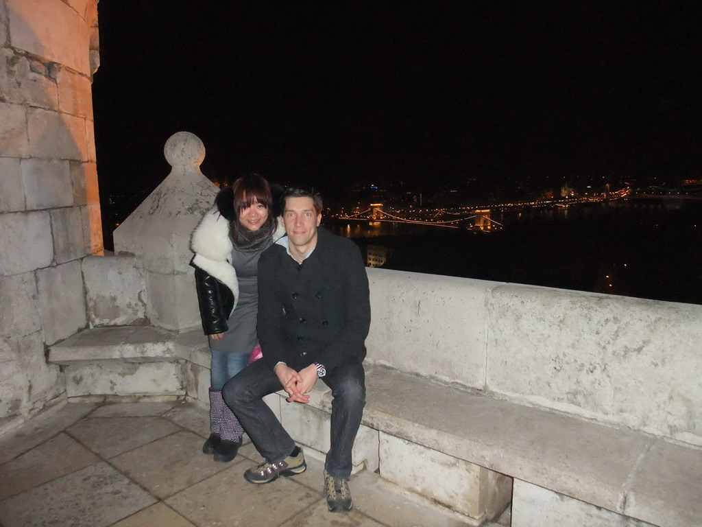 Tim and Miaomiao at the Fisherman`s Bastion, with view on the Széchenyi Chain Bridge over the Danube river, by night