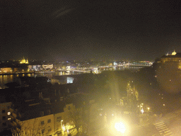 The Széchenyi Chain Bridge and the Elisabeth Bridge over the Danube river, the Gresham Palace and Saint Stephen`s Basilica, viewed from the Fisherman`s Bastion, by night