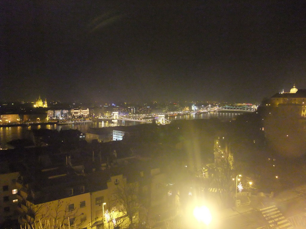 The Széchenyi Chain Bridge and the Elisabeth Bridge over the Danube river, the Gresham Palace and Saint Stephen`s Basilica, viewed from the Fisherman`s Bastion, by night