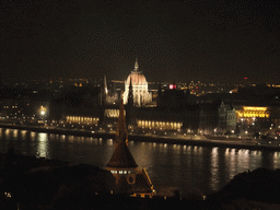 The Hungarian Parliament Building, the Danube river and the Reformed Church of Szilágyi Dezso Tér, viewed from the Fisherman`s Bastion, by night