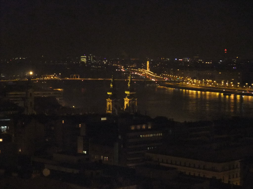 The Church of St. Anne, Margaret Island and the Margaret Bridge over the Danube river, viewed from the Fisherman`s Bastion, by night