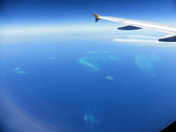 The Kelso Reef, the Rib Reef, the Trunk Reef, the Bramble Reef, the Walker Reef and the Britomart Reef of the Great Barrier Reef, viewed from the airplane from Brisbane