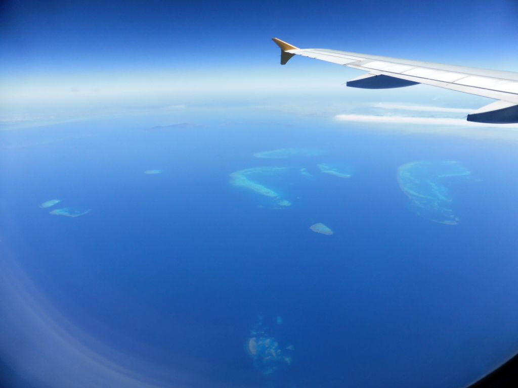 The Kelso Reef, the Rib Reef, the Trunk Reef, the Bramble Reef, the Walker Reef and the Britomart Reef of the Great Barrier Reef, viewed from the airplane from Brisbane