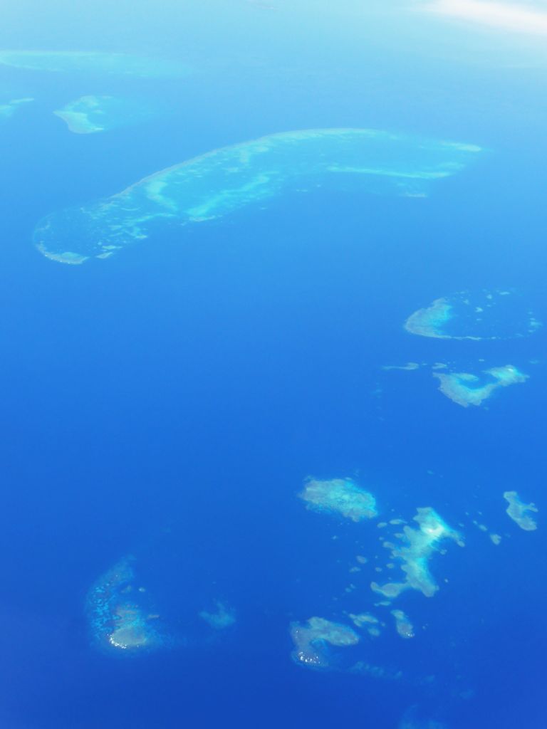 The Britomart Reef, the Duncan Reef and the Barnett Patches of the Great Barrier Reef, viewed from the airplane from Brisbane