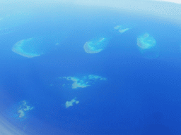 The Noreaster Reef, the Yamacutta Reef, the Taylor Reef, the Beaver Reef and the Farquharson Reef of the Great Barrier Reef, viewed from the airplane from Brisbane