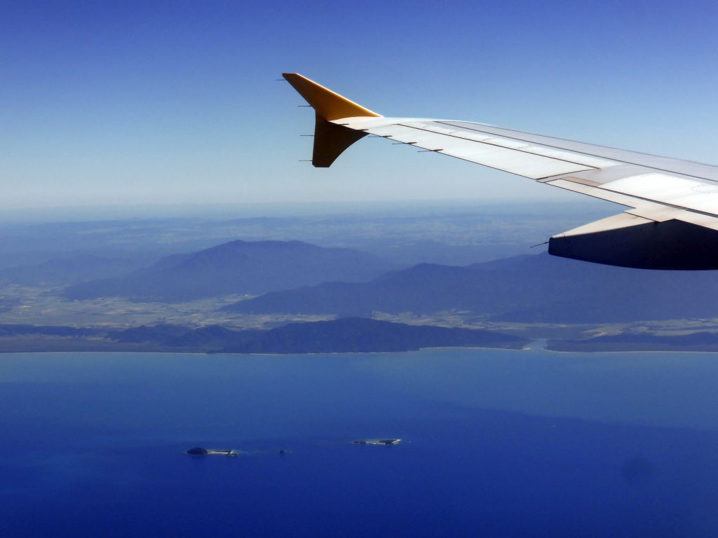 The Round-Russel Reef, the Jones Patch and the Normanby-Mabel Reef of the Great Barrier Reef and the Russell River National Park, viewed from the airplane from Brisbane