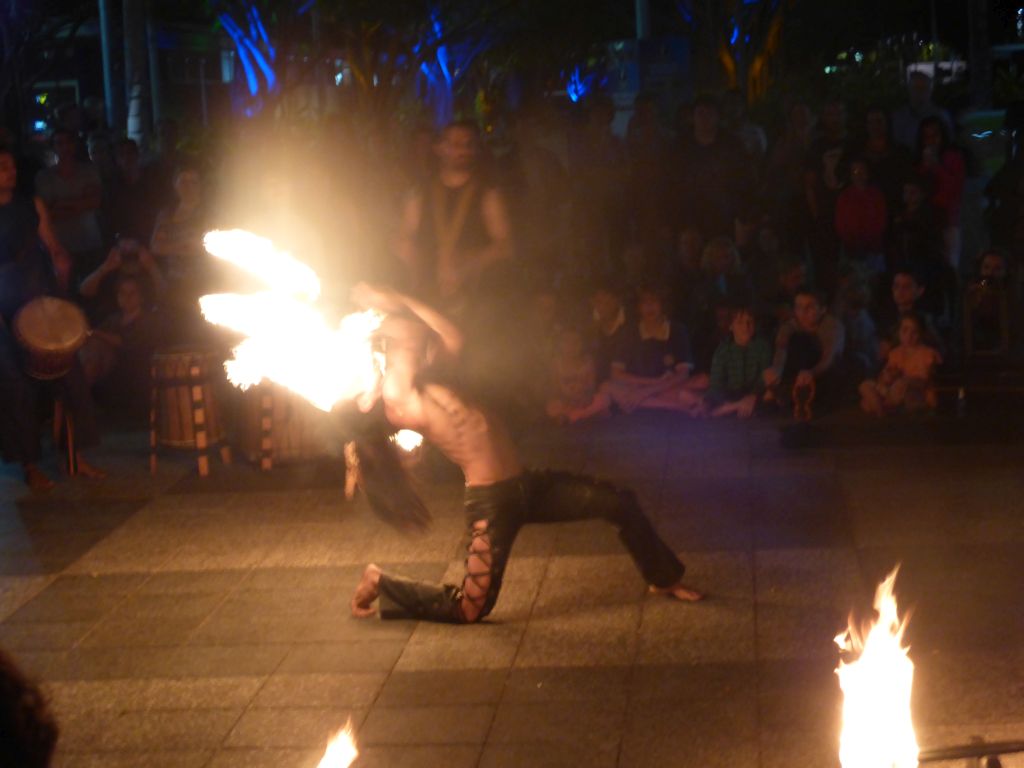 Fire artist at the Cairns Esplanade Fogarty Park, by night