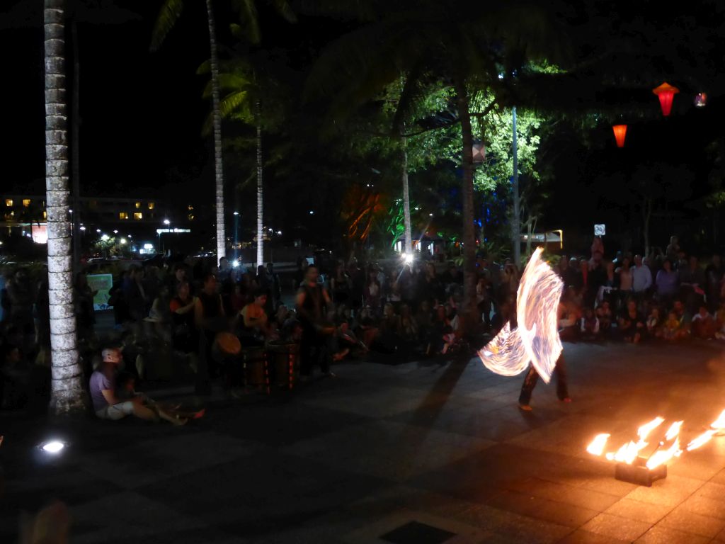 Fire artist at the Cairns Esplanade Fogarty Park, by night