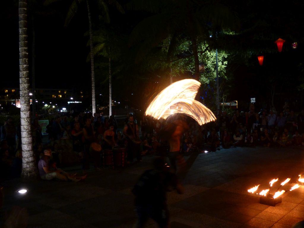 Fire artist at the Cairns Esplanade Fogarty Park, by night