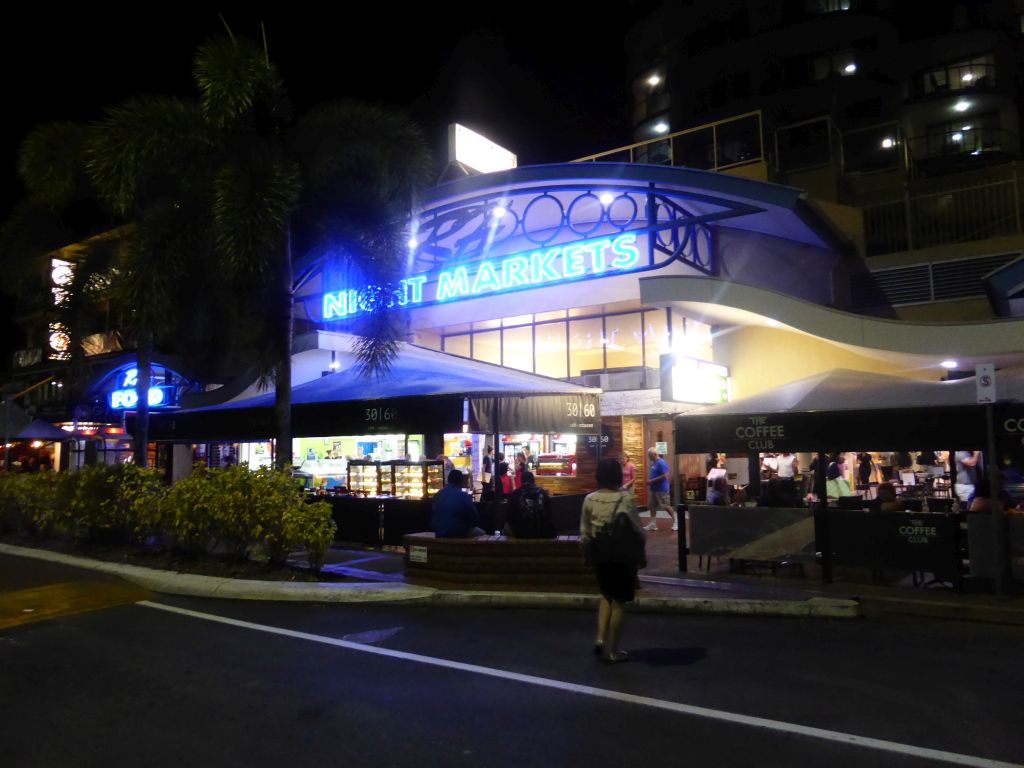 Miaomiao in front of the entrance to the Night Markets at the Cairns Esplanade, by night