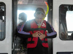 Crew on the Seastar Cruises tour boat explaining the snorkeling equipment