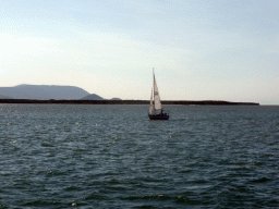 Boat in Trinity Bay and hills near Cairns, viewed from our Seastar Cruises tour boat coming from Hastings Reef