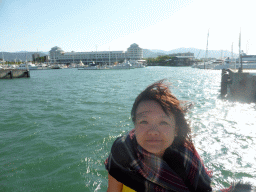 Miaomiao at our Seastar Cruises tour boat coming from Hastings Reef, with a view on the Marlin Marina and the Shangri-La Hotel The Marina Cairns