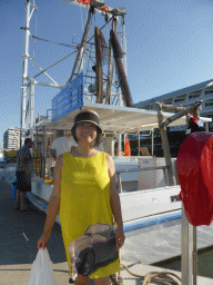 Miaomiao in front of the Seafood Boat at Finger E of the Marlin Marina