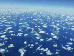 The Ellison Reef, the Adelaide Reef, the Eddy Reef, the Potter Reef and the Farquharson Reef of the Great Barrier Reef, viewed from the airplane to Sydney