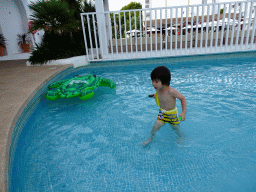 Max with an inflatable turtle at the main swimming pool at the Prinsotel Alba Hotel Apartamentos