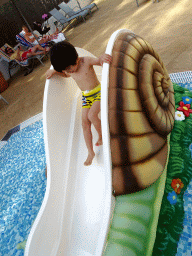 Max on a slide at the Mini Splash swimming pool at the Prinsotel Alba Hotel Apartamentos