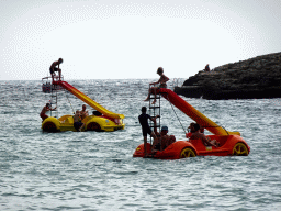 Slide boats at the Cala Gran beach