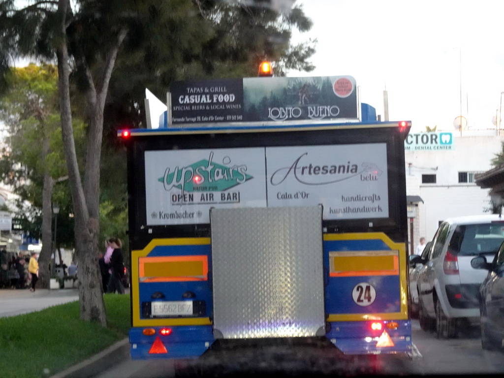 Back side of the tourist train at the Avinguda dels Benvinguts, viewed from the rental car