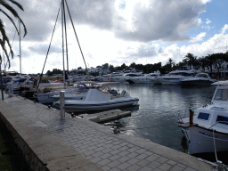 Boats at the east side of the Port Esportiu Marina de Cala d`Or harbour, viewed from the Avinguda de Cala Llonga street