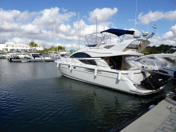 Boats at the east side of the Port Esportiu Marina de Cala d`Or harbour, viewed from the Avinguda de Cala Llonga street