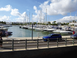 Boats at the west side of the Port Esportiu Marina de Cala d`Or harbour, viewed from the Avinguda de Cala Llonga street