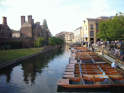 Punt boats in the Cam river and Magdalene College, viewed from Magdalene street