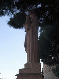 Statue at the outer courtyard of the Eglise du Suquet church