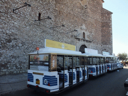 Cannes tourist train in front of the Eglise du Suquet church