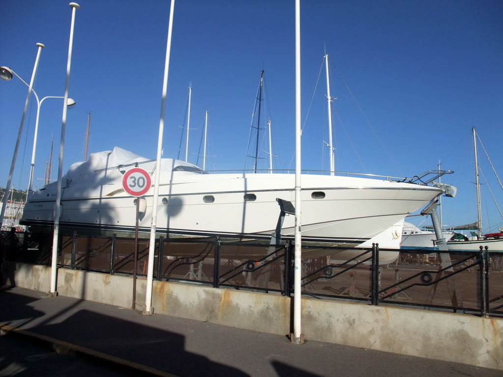 Boat in the Cannes harbour, viewed from the Cannes tourist train