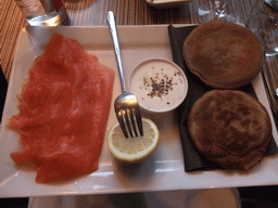 Salmon and bread in restaurant `Mocca` at the Boulevard de la Croisette